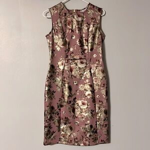 Sleeveless floral dress. Tags still on. Fits more like a medium.